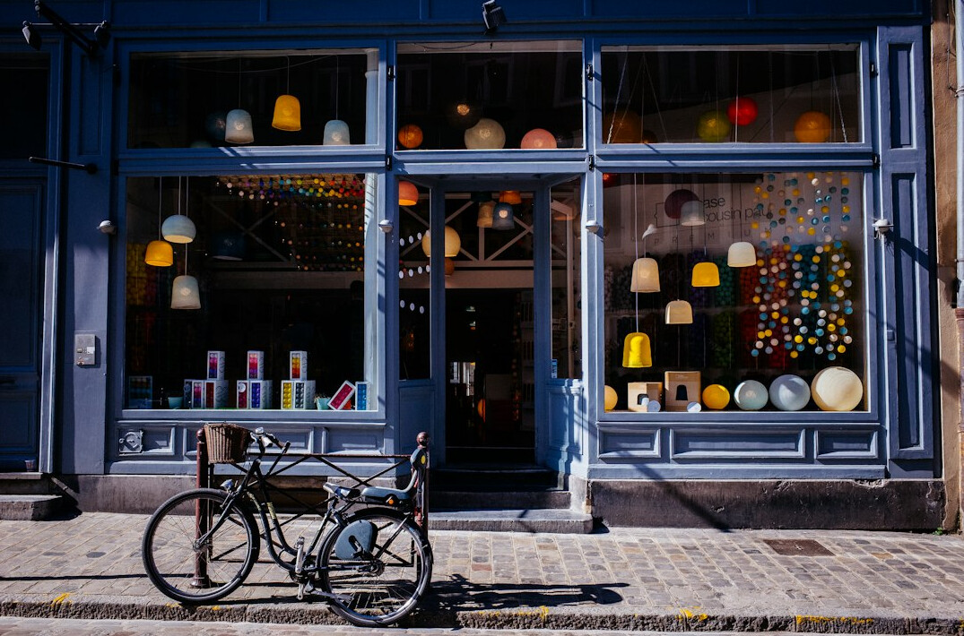 Cargo bike parked in front of a shop