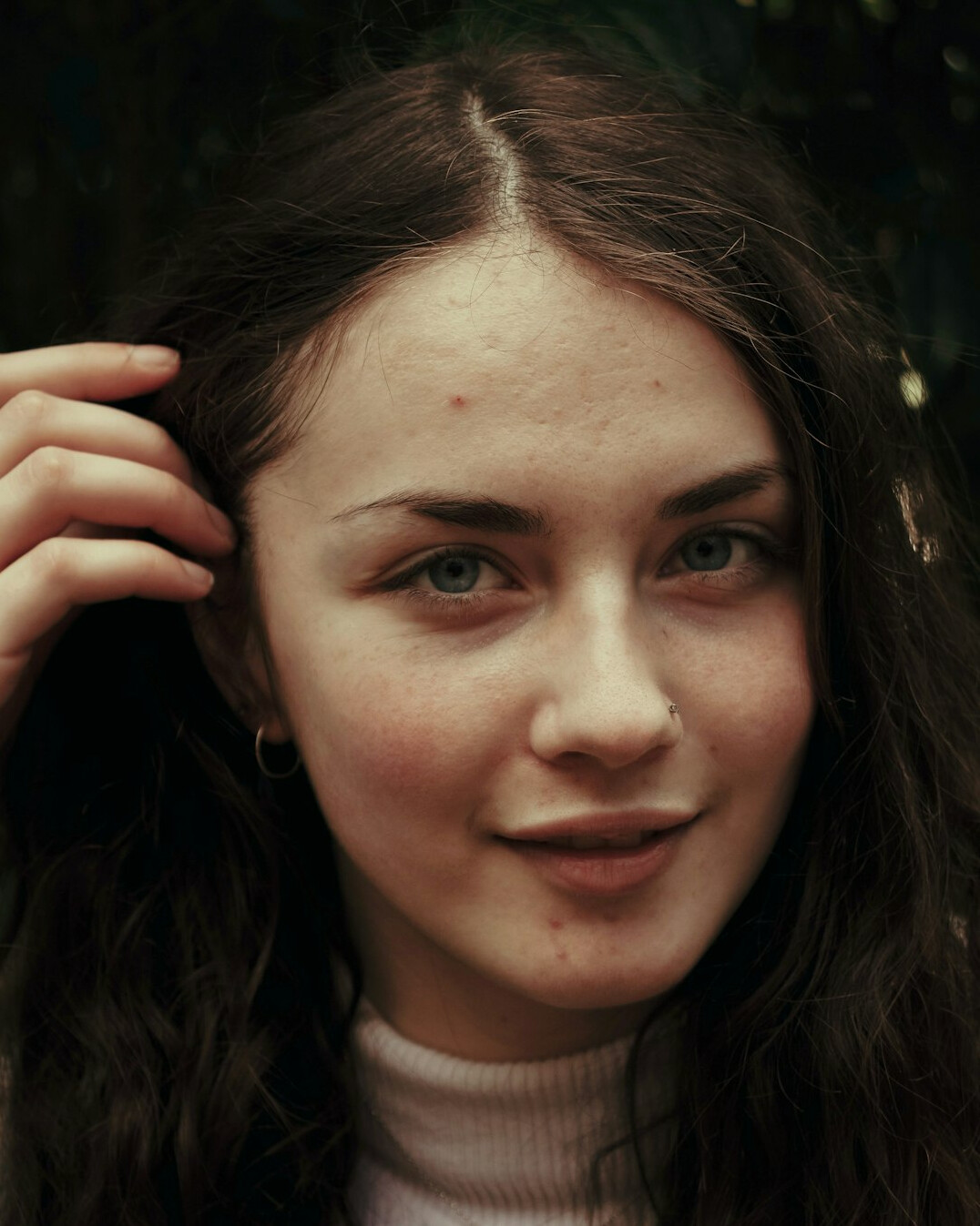 Portrait of a smiling woman with brown hair